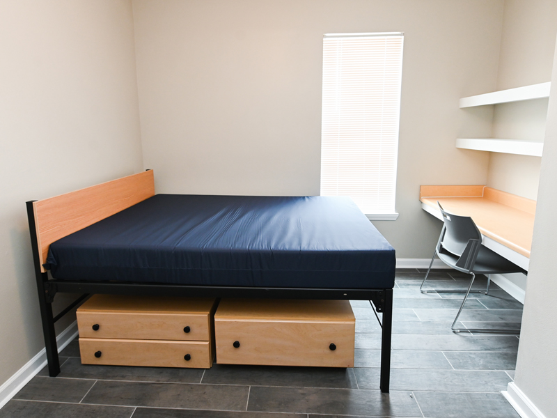 An empty dorm room.