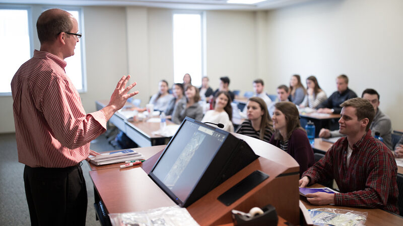 UTK professor teaching a business class.