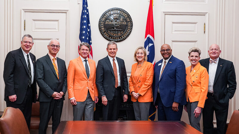 Seven members of the UT System executive leadership standing with Tenn. Gov. Bill Lee for a photo.