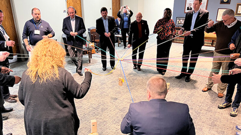 Newly elected Tennessee legislators participate in a teambuilding activity during the 2022 Tennessee Legislative Leaders Academy.