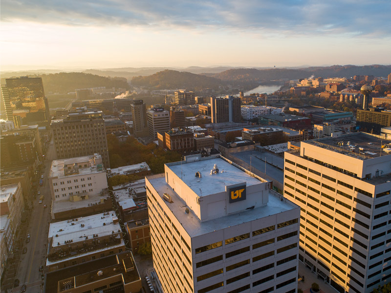 Sunrise aerial view of downtown Knoxville, showing UT Tower.