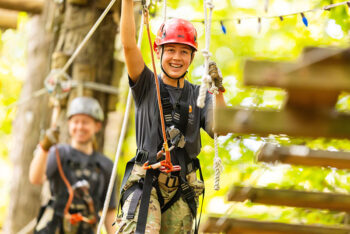 Army ROTC students navigate the Navitat Knoxville ropes course at Ijams Nature Center.