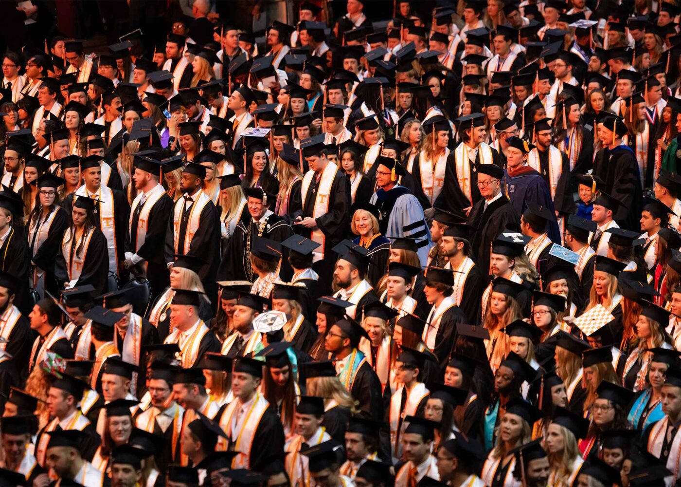Large crowd of graduating students and accompanying faculty.