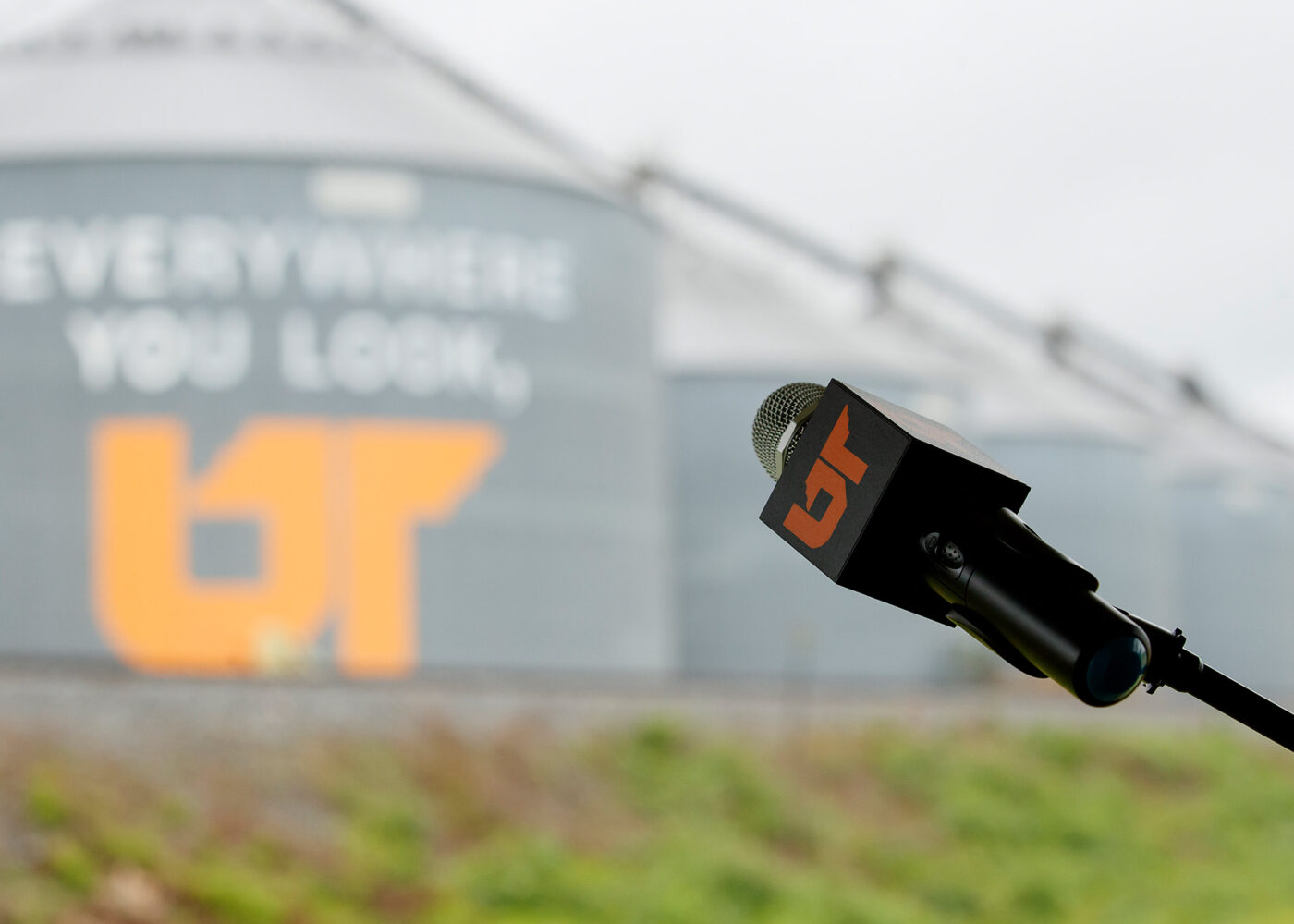 Close up image of a microphone branded with the UT icon.