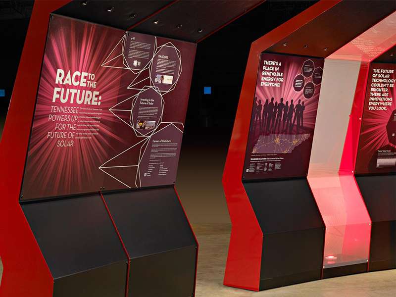 Red exhibit area talking about the future from the Spectrum Solar Farm Exhibit.