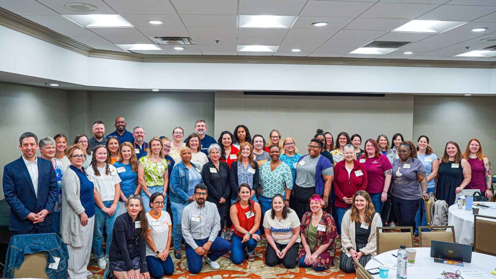 A group photo of UT System staff at the UT Wellness Summit