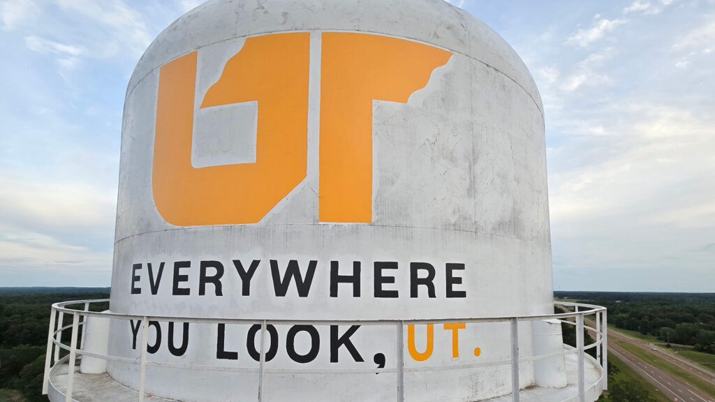 Close-up photo of the 'Everywhere You Look, UT' mural painted on the side of the Selmer water tower in McNairy, Tenn.