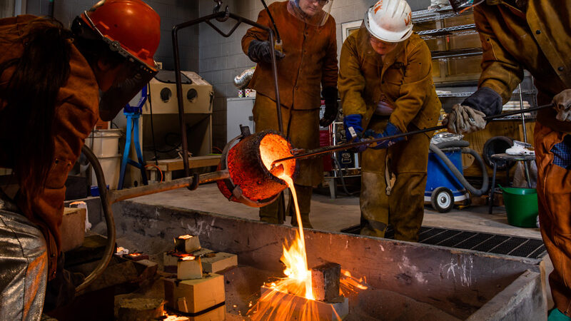 A student works on a metal sculpture inside the Art and Architecture Building on April 12, 2022. Photo by Steven Bridges/University of Tennessee