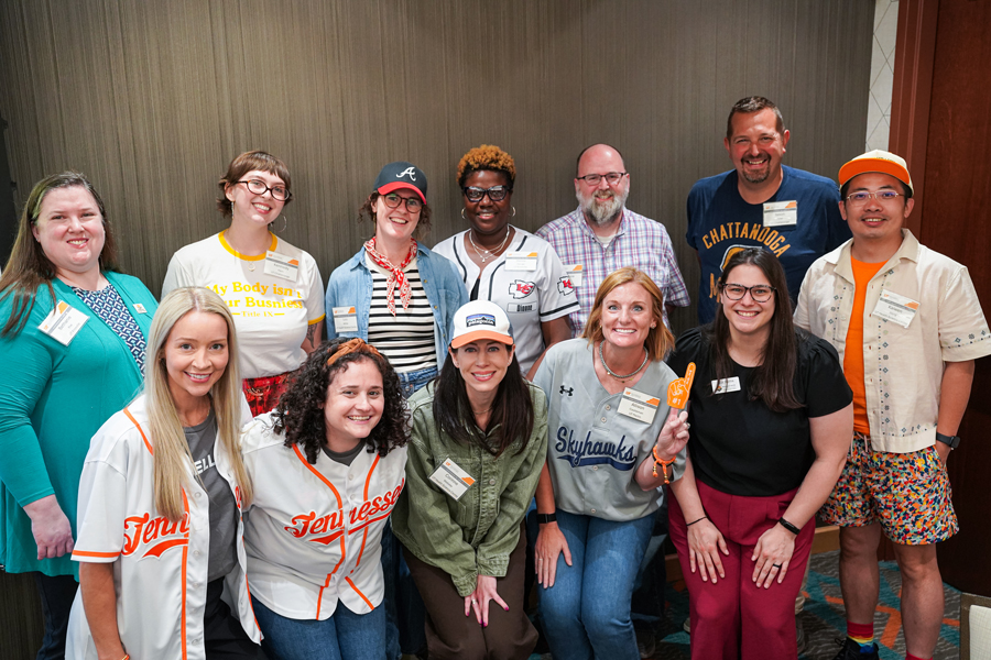 Group of attendees smiling for a photo at the UT Wellness Mini Grants Event.